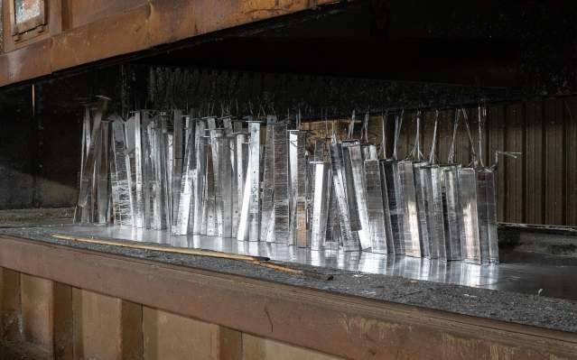Metal bleacher parts being manufactured